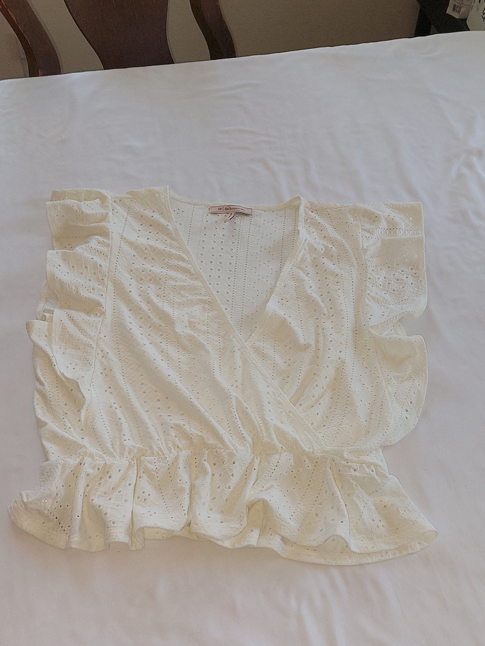 BCBGeneration Ivory Eyelet Wrap Peplum Blouse.Size M